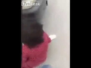 Woman bangs her head on a van's bumper
